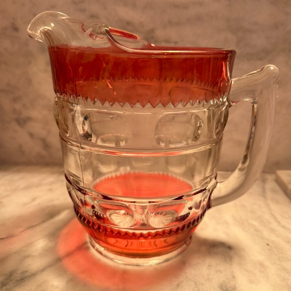 Vintage Tiffin-Franciscan King's Crown thumbprint pitcher with cranberry flash